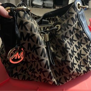 Large MK Micheal Kors purse with black letters